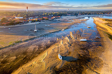 France. Gironde(33)  Lege Cap Ferret. Aerial view at low tide of Mimbeau beach with the lighthouse at sunset