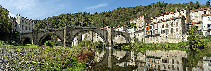 France. Auvergne . Haute Allier. Lavoute Chilhac classified as one of the most beautiful villages of France. Stone bridge of the XV century over the Allier river