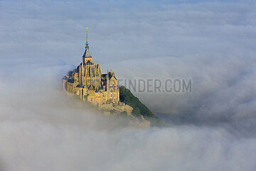 France. Normandy. Manche (50) Aerial view of the bay of Mont-Saint-Michel. Morning mists around the Mount