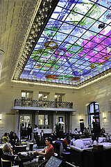 France. Paris (75) 6th arrondissement. The Hotel Lutetia  an emblematic luxury establishment  restored and renovated by the architectural firm Jean-Michel Wilmotte. A colorful work by the artist Fabrice Hyber now adorns the glass roof of the Saint-Germain salon