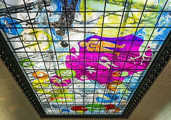 France. Paris (75) 6th arrondissement. The Hotel Lutetia  an emblematic luxury establishment  restored and renovated by the architectural firm Jean-Michel Wilmotte. A colorful work by the artist Fabrice Hyber now adorns the glass roof of the Saint-Germain salon