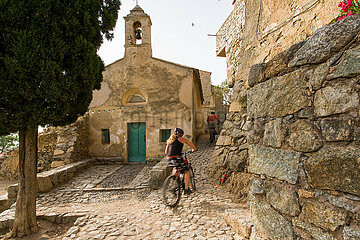 France  Haute-Corse (2B) Balagne region  mountain biker in Sant'Antonino village