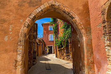 France. Provence. Vaucluse (84) Luberon regional natural park. Labeled as one of the most beautiful villages in France  the village of Roussillon with its astonishing palette of flamboyant colors