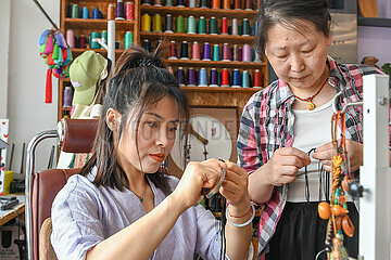 China-Jilin-String-Weaving-intangible Kulturerbeerbe (CN)