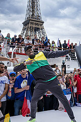 FRANCE. PARIS (75) 16 TH ARRONDISSEMENT. PORT DEBILLY  CELEBRATION AND PRESENTATION OF THE PARIS 2024 OLYMPIC TORCH BY USAIN BOLT (THE CELEBRATED JAMAICAN ATHLETE  OLYMPIC SPRINT CHAMPION) IN FRONT OF THE FRENCH OLYMPIC TEAM SUPPORTERS