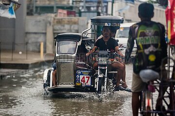 Die Philippinen-Malabon-Stadttyphoon Doksuri