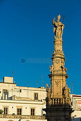 ITALY. PUGLIA REGION. ITRI ??VALLEY. VILLAGE OF OSTUNI  LISTED AS WORLD HERITAGE OF HUMANITY BY UNESCO. A STATUE IN THE CENTER OF THE MAIN SQUARE  REPRESENTING SAINT ORONZO  PATRON OF OSTUNI