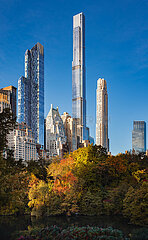 UNITED STATES  NEW YORK CITY  MANHATTAN. CENTRAL PARK IN FALL WITH VIEW ON THE MIDTOWN BILLIONAIRES ROW SKYSCRAPERS (INCLUDING ONE57  CENTRAL PARK TOWER AND 220 CENTRAL PARK SOUTH)