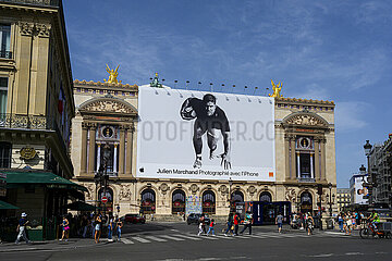 FRANCE. PARIS (75) 9TH DISTRICT. ON AN EPHEMERAL FACADE OF THE OPERA GARNIER  FRENCH RUGBYMAN  JULIEN MARCHAND  WEARED FOR A GIANT ADVERTISEMENT FOR THE IPHONE (APPLE). SIX FRENCH RUGBY INTERNATIONALS WERE PHOTOGRAPHED[ WITH THE IPHONE 14 PRO BY BRITISH FASHION PHOTOGRAPHER  JACOB SUTTON. SERIES OF PHOTOS EXHIBITED ON SEVERAL FAMOUS MONUMENTS IN PARIS