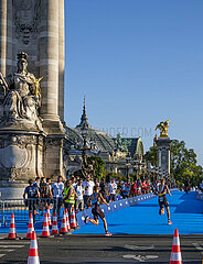 FRANCE. PARIS (75) 7 TH ARRONDISSEMENT. AUGUST 2023: ONE YEAR BEFORE THE PARIS 2024 OLYMPIC GAMES  TRIATHLON TEST COMPETITION SERVING AS A DRESS REHEARSAL. HERE  ON THE ALEXANDRE III BRIDGE