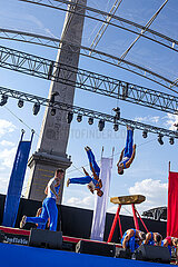 FRANCE. PARIS (75) (8TH DISTRICT) ON THE OCCASION OF THE 2023 RUGBY WORLD CUP WHICH IS TAKING PLACE IN FRANCE  A ?RUGBY VILLAGE? (FAN ZONE) HAS BEEN SET UP AT PLACE DE LA CONCORDE DURING THE ENTIRE COMPETITION.. GYMNASTICS DEMONSTRATION BY THE PARIS FIRE BRIGADE