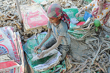 People Work Recycling Cement Bags