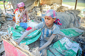 People Work Recycling Cement Bags
