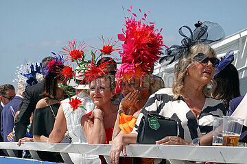 Epsom Downs  Fashion: Women with hats at the racecourse