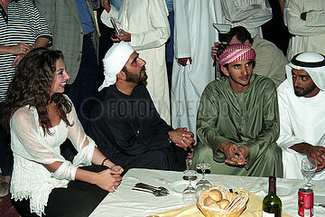 Dubai  Sheikh Mohammed bin Rashid al Maktoum (second from left) and his eldest son Sheikh Rashid (in green) at the Arabian Night