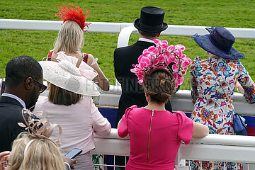 Epsom Downs  Fashion: Audience with hats at the racecourse