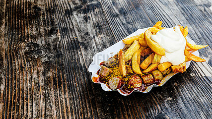 Delicious German Duo: Currywurst & Fries with Mayo