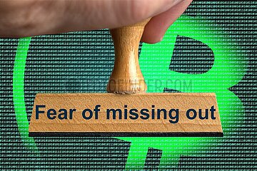 Symbolischer Stempel Fear of missing out