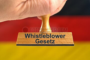 Symbolischer Stempel Whistleblower-Gesetz