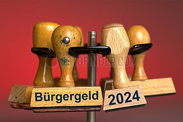 Symbolische Stempel Buergergeld 2024