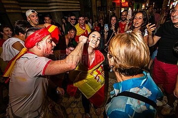 Spain fans celebrate beating France in semi-final of Euro 2024