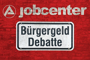 Symbolisches Schild Buergergeld Debatte