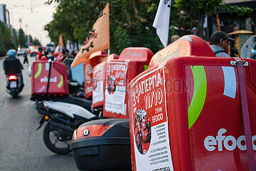 Greece: Delivery workers drive their motorcycles demanding better working conditions.