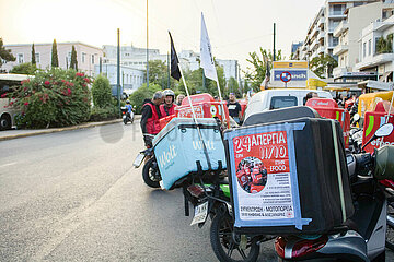 Greece: Delivery workers drive their motorcycles demanding better working conditions.