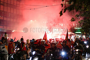 Greece: Delivery workers drive their motorcycles demanding better working conditions.