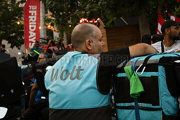 Greece: Delivery workers drive their motorcycles demanding better working conditions.