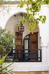 Traditional balcony and moorish arches architecture in Marrakech  Morocco  March 2023