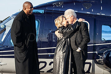 Former Los Angeles Lakers star Earvin Magic Johnson greets former U.S. President Bill Clinton and Hillary Clinton December 18  2007