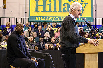 Bill Clinton And Magic Johnson Campaign For Hillary In Iowa
