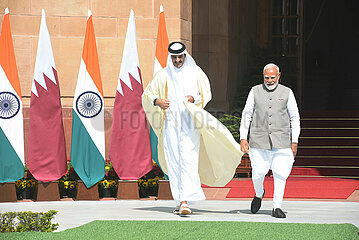 Narendra Modi meets Sheikh Tamim Bin Hamad Al-Thani