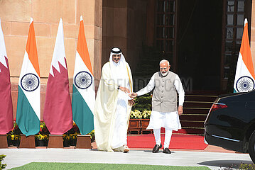 Narendra Modi meets Sheikh Tamim Bin Hamad Al-Thani