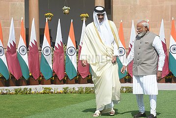 Narendra Modi meets Sheikh Tamim Bin Hamad Al-Thani
