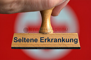 Symbolischer Stempel Seltene Erkrankung