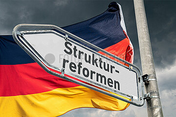 Symbolischer Wegweiser Strukturreformen
