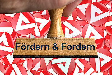 Symbolischer Stempel Foerdern & Fordern
