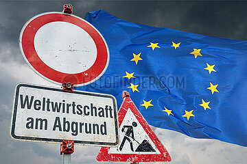 Symbolische Schilder Weltwirtschaft am Abgrund
