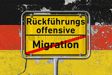 Symbolisches Ortsschild Rueckfuehrungsoffensive - Migration