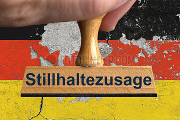 Symbolischer Stempel Stillhaltezusage