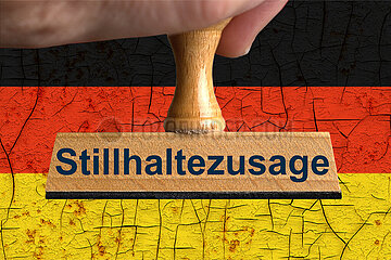 Symbolischer Stempel Stillhaltezusage