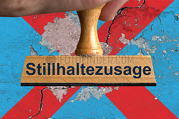 Symbolischer Stempel Stillhaltezusage